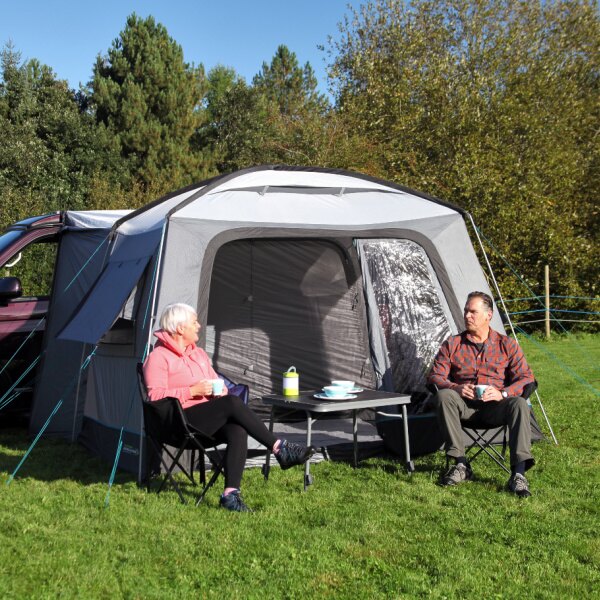 Cayman Cuda FG Driveaway Awning shown with a couple sitting