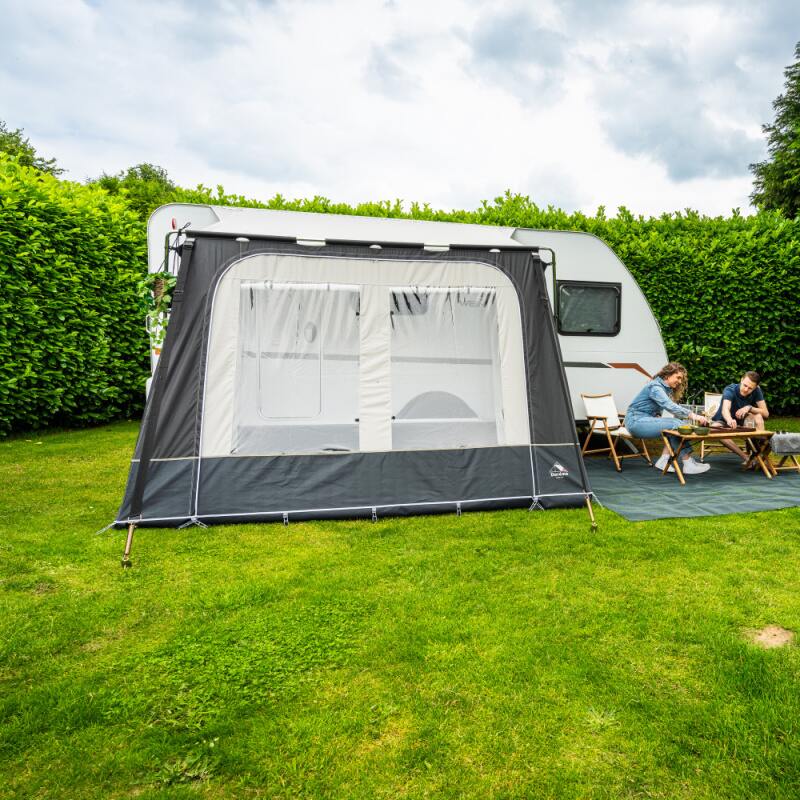 Dorema Mistral Awning in grey in a field shown from the front