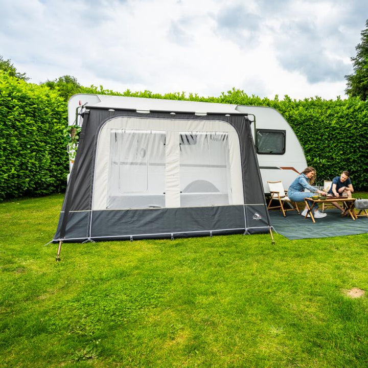Dorema Mistral Awning in grey in a field shown from the front
