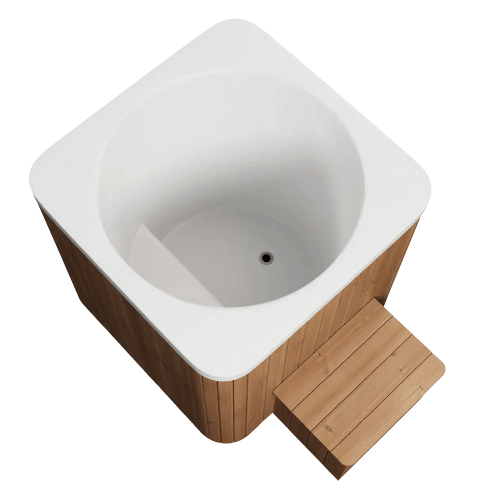 Top-down angled view of square cold plunge tub with white interior and wooden step on a white background