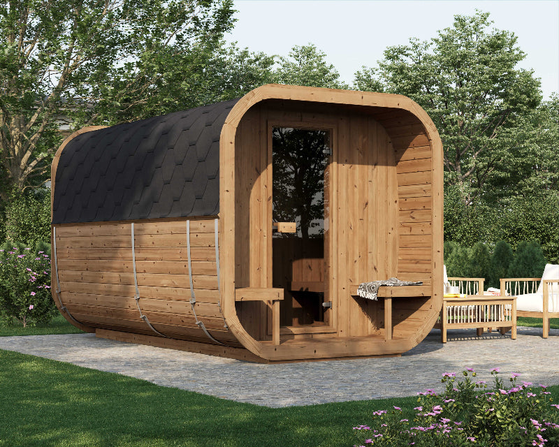 InMedias Sauna Icon 385XL outdoor view with benches, situated on stone patio in garden – realistic setting with green lawn and trees in background.
