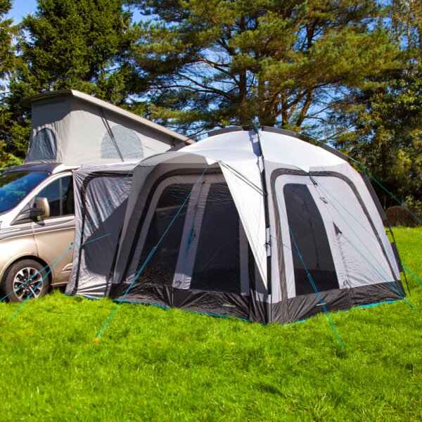 Outdoor Revolution Q Cayman T1 Driveaway Awning shown with closed windows in a field