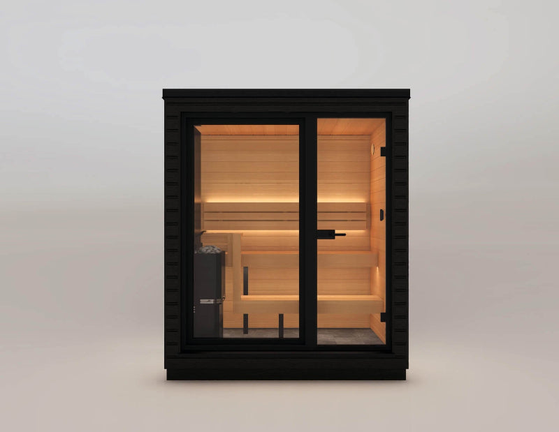 A frontal view of a small modern sauna with glass double doors and interior bench seating on a plain background.