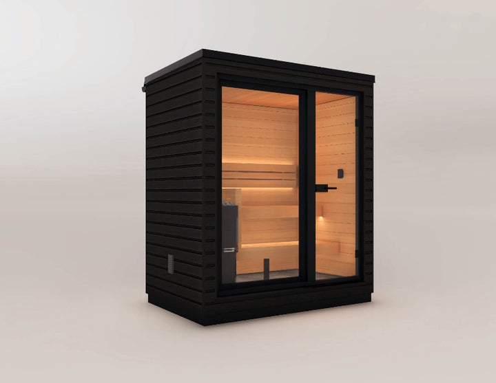 A modern black sauna with large glass doors, showing the wood-paneled interior and bench seating on a plain background.