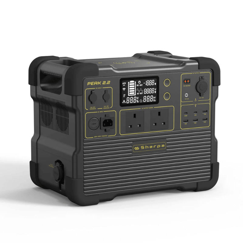 Angled view of the Sherpa Peak 2.2 power station in a black-and-yellow color variant, highlighting its rugged design and full interface panel, on a white background.