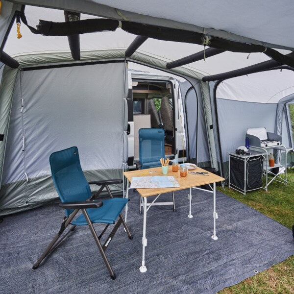 Trigano Phuket Inflatable Awning with a table and chairs inside