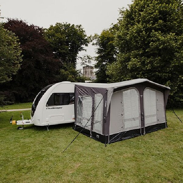 A Vango Riviera 390 with closed panels in a field