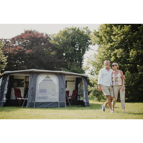 A couple standing to the right side of a Vango tuscany 500