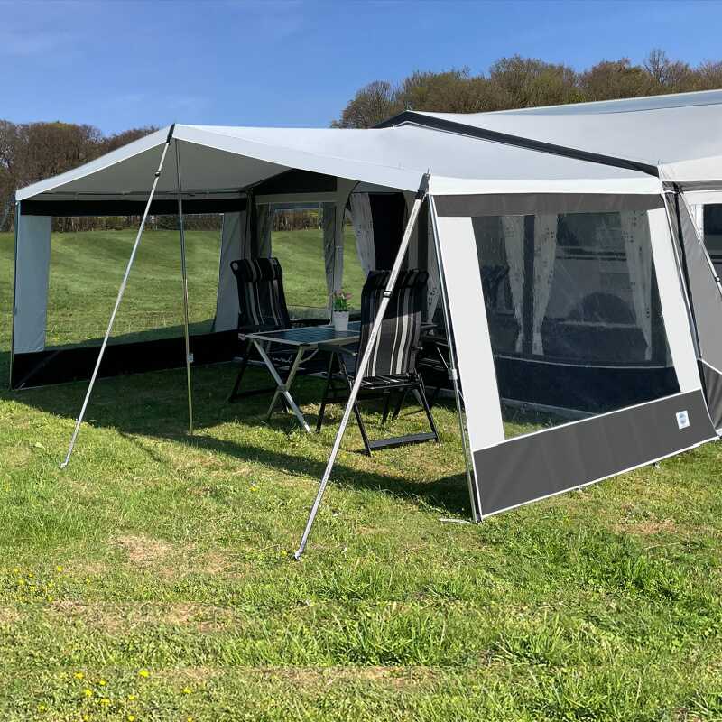 A Walker Castel Sun Canopy with side panels in a field