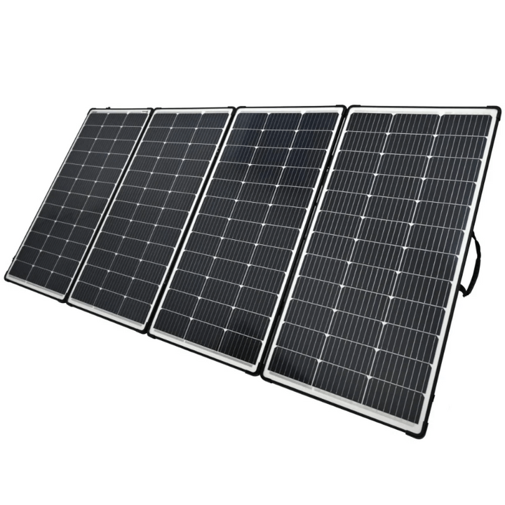 Bluetti 440W solar panel fully unfolded and tilted on the ground for optimal sunlight capture, on a white background.