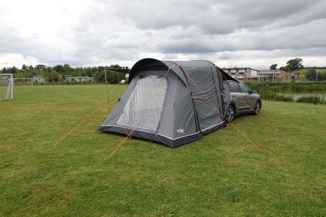 Camptech Adelaide car tent setup demonstration, showing durable air-frame design and rear vehicle attachment at a campsite.