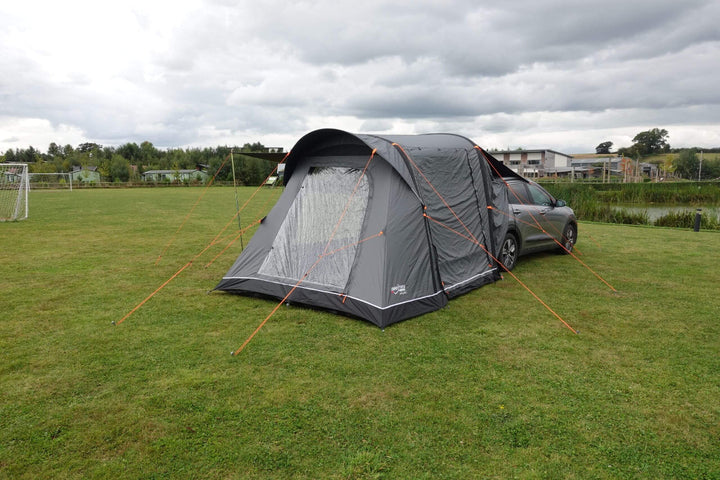 Camptech Adelaide car tent setup demonstration, showing durable air-frame design and rear vehicle attachment at a campsite.
