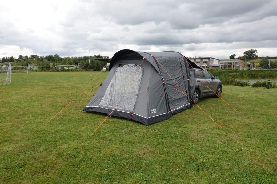 Camptech Adelaide car tent setup demonstration, showing durable air-frame design and rear vehicle attachment at a campsite.