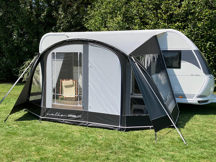 Front view of closed Walker Combi-Luxe awning setup, with visible logo, mesh window, and shaded interior.