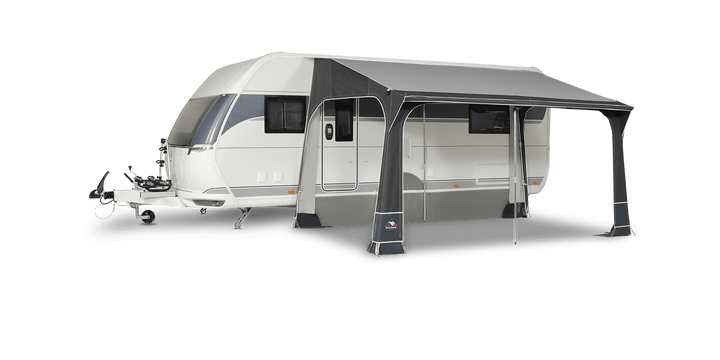 Dorema Quartz 400 De Luxe poled porch awning with full annex attached to caravan, showing window curtains and roof support structure on a transparent background.