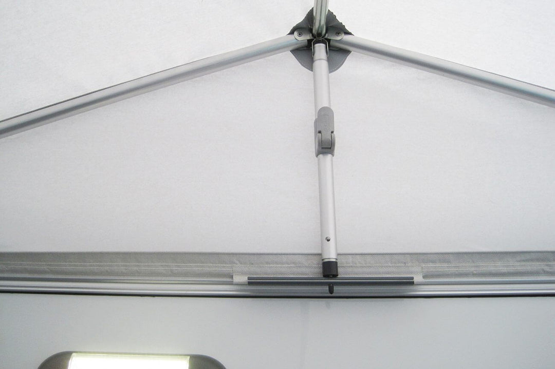 Close-up of Walker awning roof frame connected above caravan window inside the Walker Eriba Touring 630/642 awning.