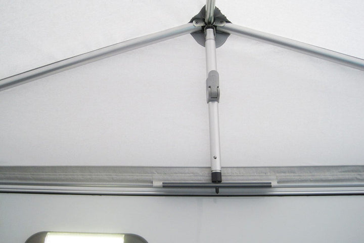 Close-up of Walker awning roof frame connected above caravan window inside the Walker Eriba Touring 630/642 awning.