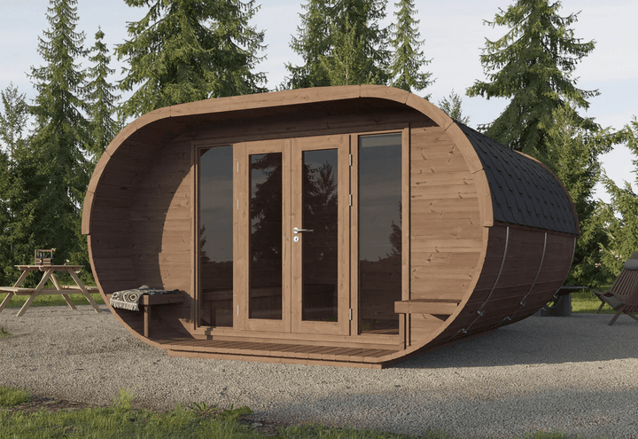 Outdoor view of InMedias Camping Oval 400 placed on gravel with trees in the background, natural environment setting.