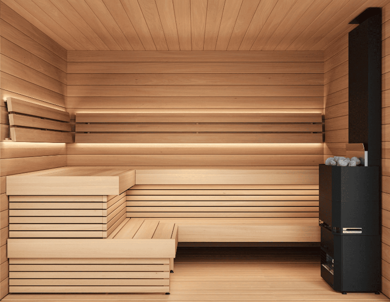 Interior of the Saunum AirCube One sauna with tiered wooden benches, sleek black heater, and ambient LED lighting.