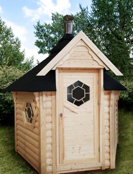 Wooden Viking Industrier sauna cabin 4.5m² with octagonal windows and black roof, placed on a grassy background with trees.