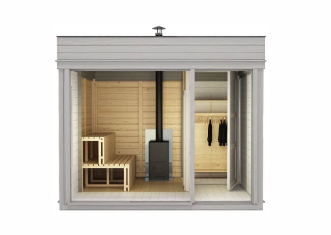 Interior view of Viking Industrier Sauna Cube with Changing Room 3 x 3m, showing sauna benches and a wood-burning stove, on a white background.