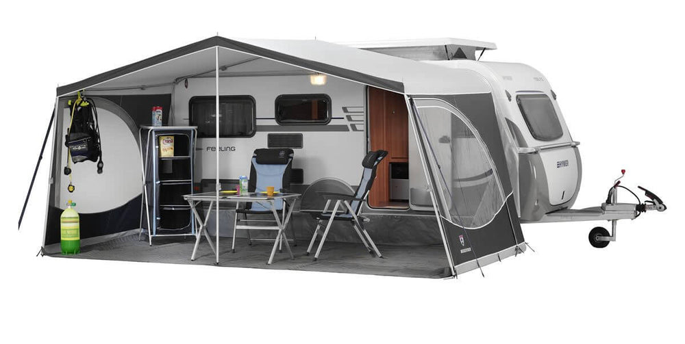 Walker Eriba Touring 630/642 awning with front panels removed, showing table and chairs set up inside the awning space, with white background.