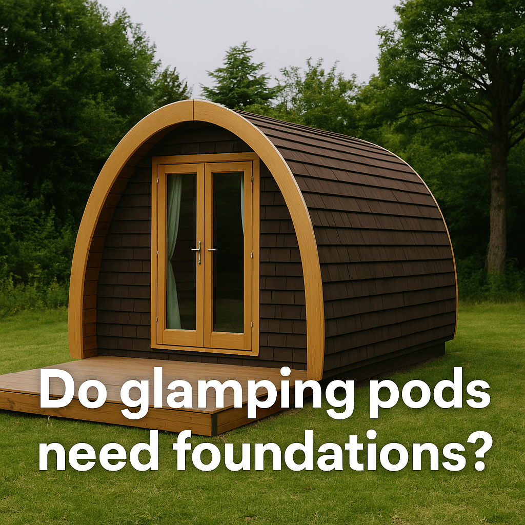 A wooden glamping pod with dark shingles and a small deck, set on green grass with trees in the background. Text on image reads: "Do glamping pods need foundations?"