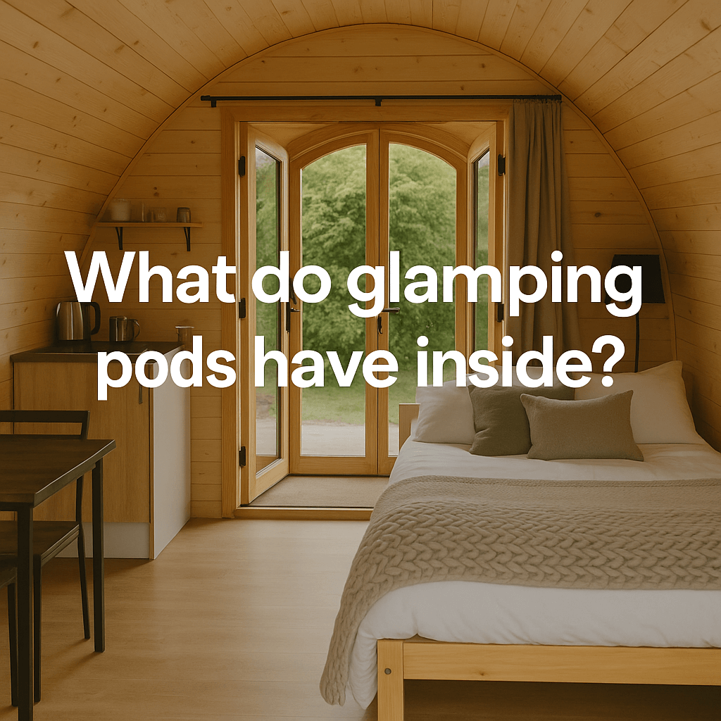  Interior of a modern wooden glamping pod with bed, kitchenette, and dining area, featuring the text "What do glamping pods have inside?"