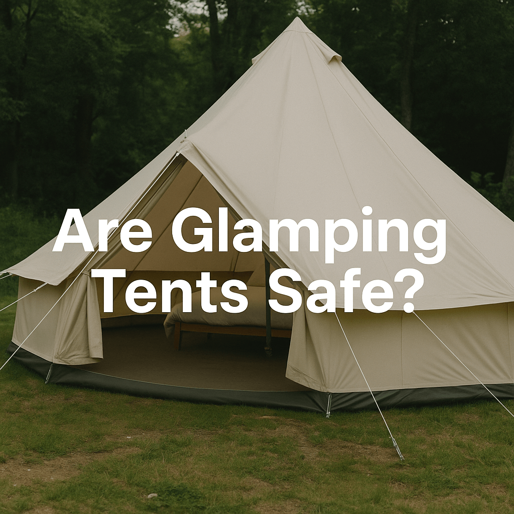 A large cream bell tent set up in a lush green forest with guy ropes securing it to the ground. Bold white text across the tent reads: "Are Glamping Tents Safe?"
