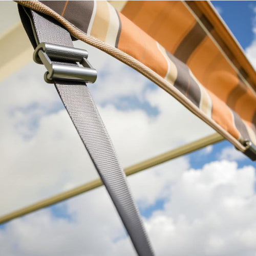 Close up of a buckle being used to secure a caravan awning