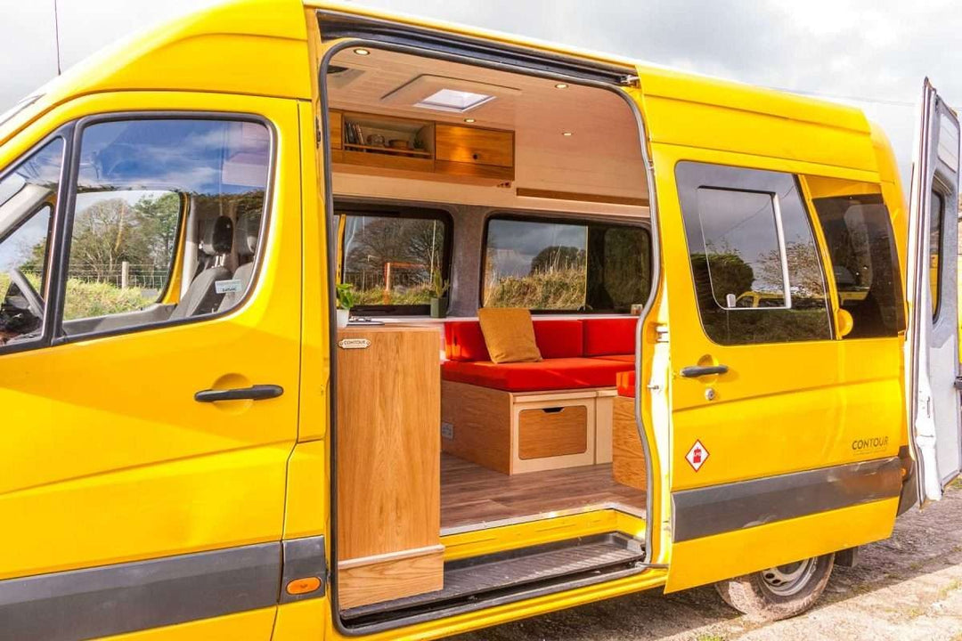 Side entrance view of the campervan revealing the Campervan Foss Kitchen Unit installed next to the sliding door.