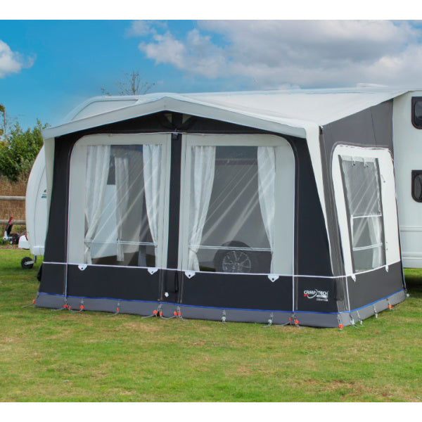 A Camptech Countess Air Awning shown from the front with the sun behind