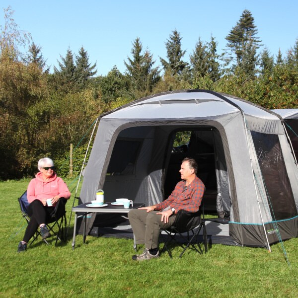 Cayman Cuda FG Awning shown with a couple on the right side