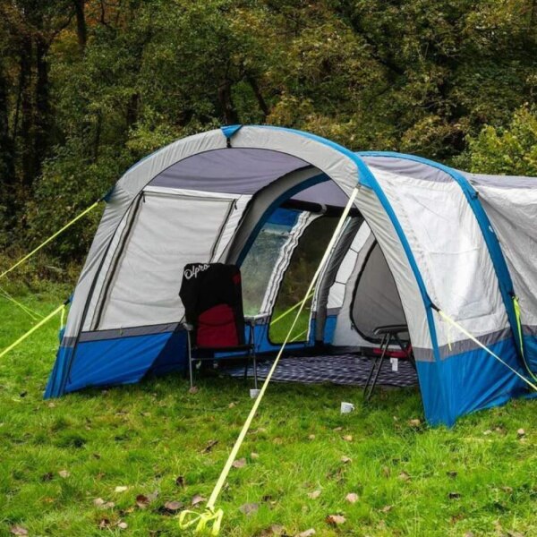 Cocoon Breeze Awning Extension in blue and grey in a field