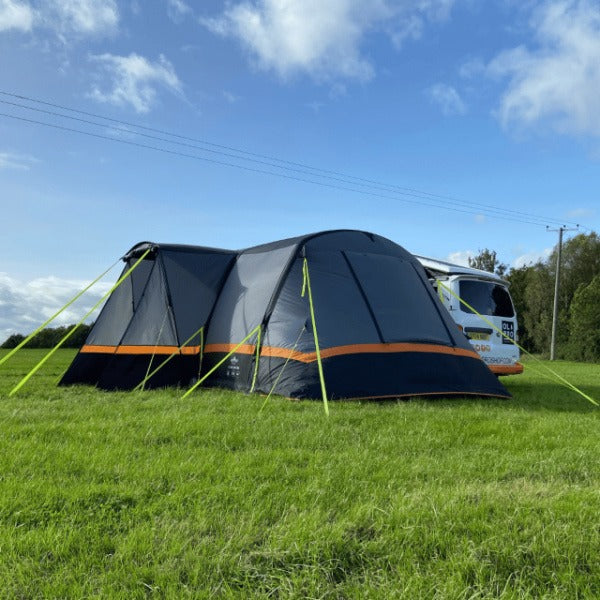 Cocoon Breeze in a field next to a campervan