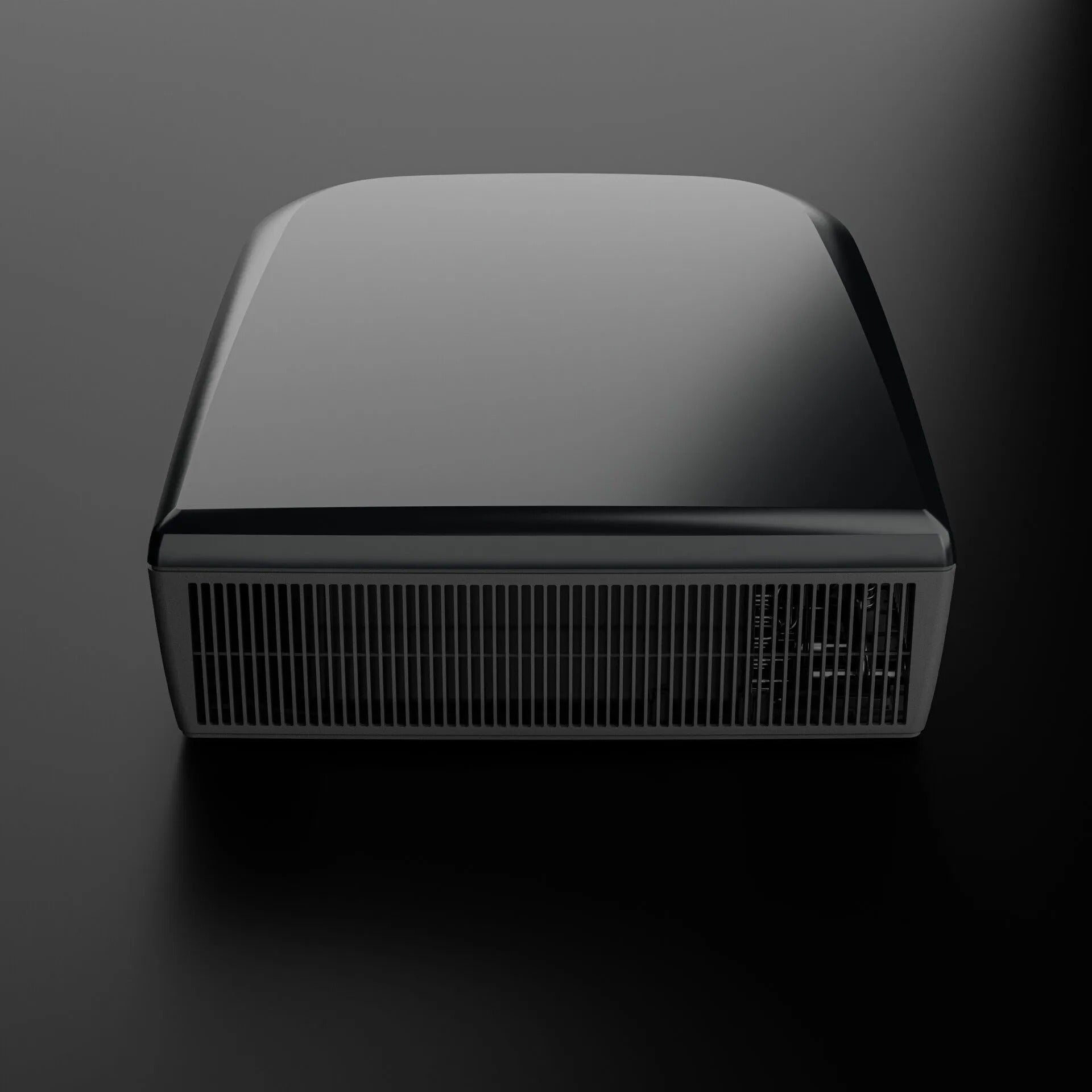 Dometic FJZ7 3000 black campervan roof air conditioner front view with vent grille detail, on a black background.