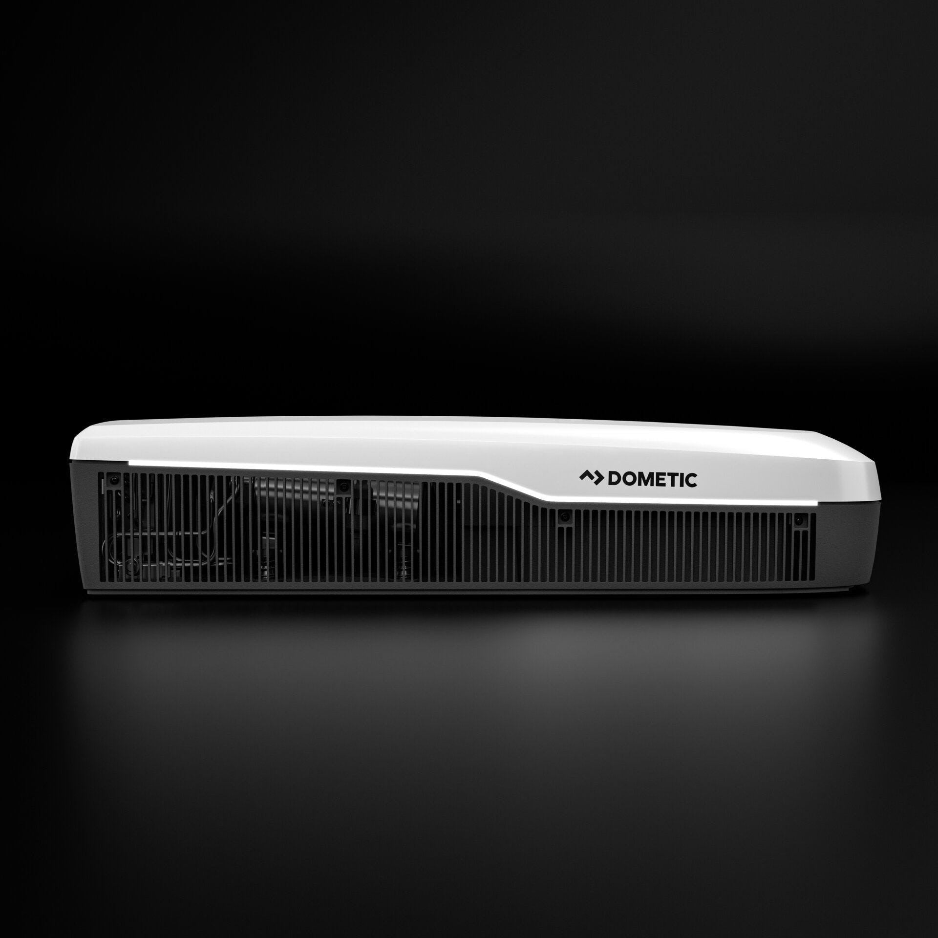 Dometic FJZ7 3000 white campervan roof air conditioner side view with airflow vents, on a  black background.