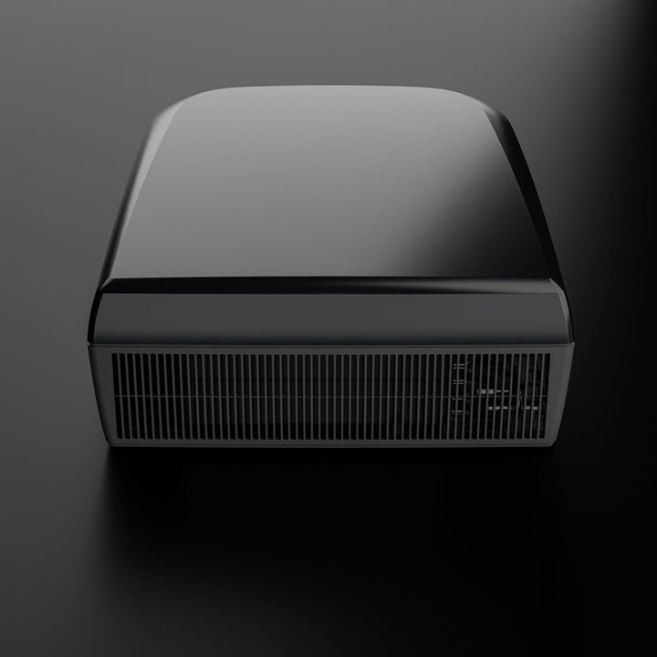 Dometic FJZ7 3500 black campervan roof air conditioner front view showing grille and housing, on a black background.