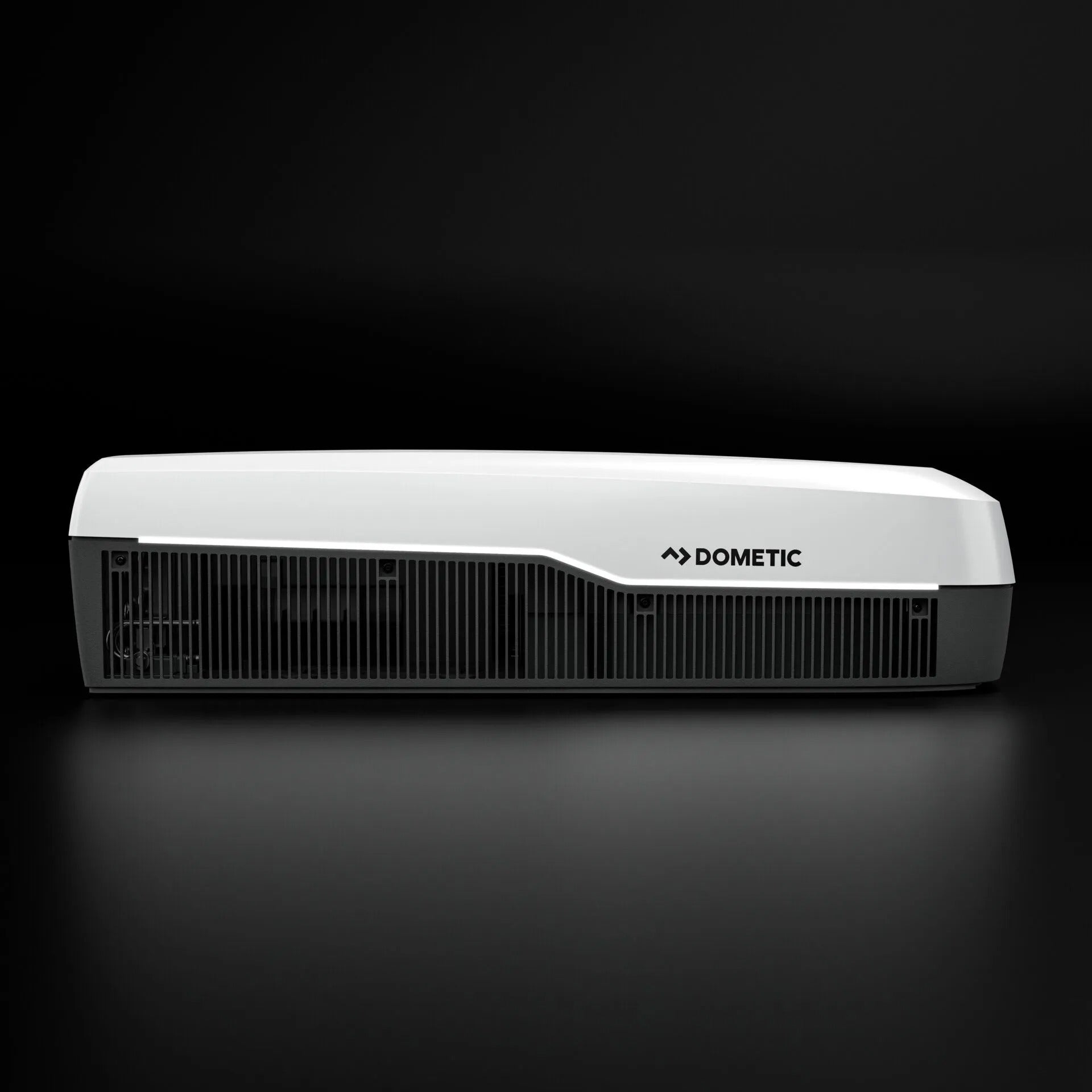 Dometic FJZ7 3500 white campervan roof air conditioner side profile with vent grille detail, on a black background.