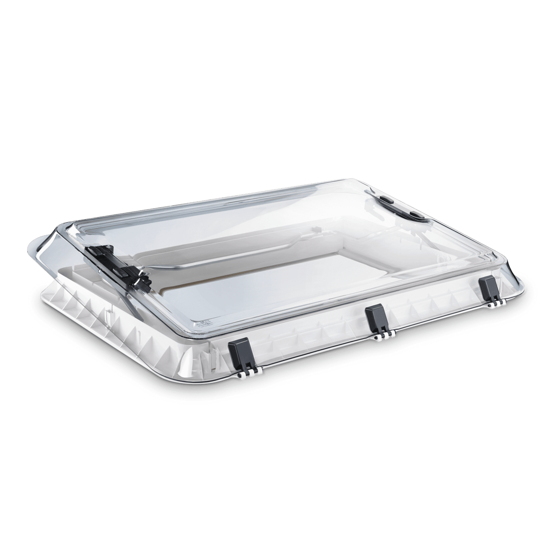 Dometic Heki 2 campervan roof skylight exterior view with clear dome lid closed on a transparent background.