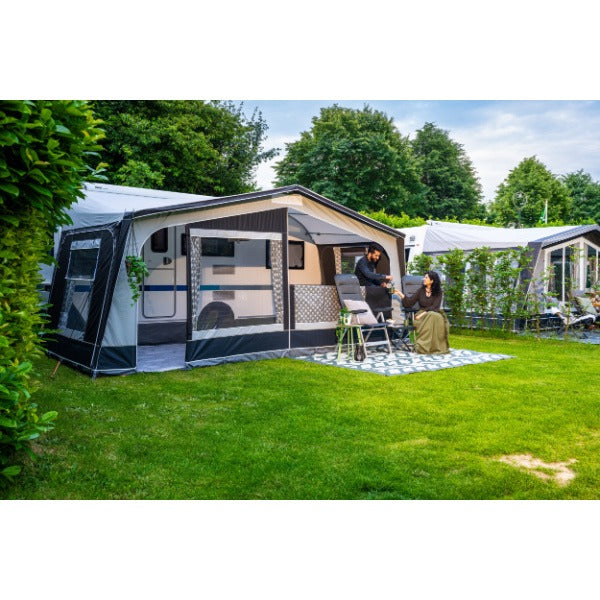 Dorema Monza 240 Full Awning being used by a couple