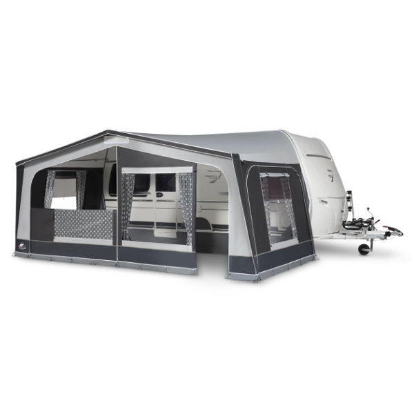 Dorema Monza XL300 awning attached to a caravan on a white background