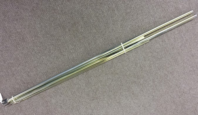 Long Dorema canopy poles arranged on a grey carpet.