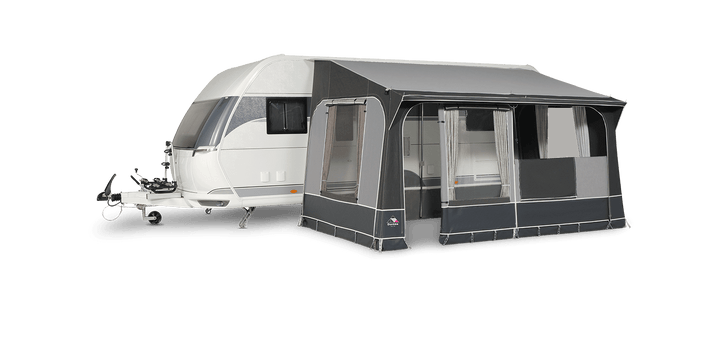 Dorema Quartz 400 De Luxe poled porch awning with full annex attached to caravan, showing window curtains and roof support structure on a transparent background.