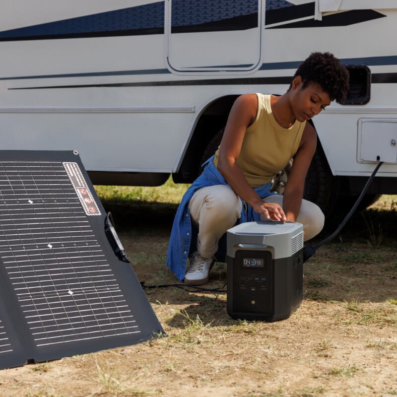 EcoFlow Delta 2 Max Woman Charging Motorhome