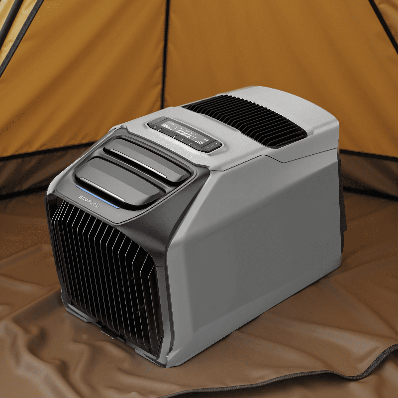 EcoFlow WAVE 3 portable air conditioner set up inside a camping tent, placed on the tent floor with vents and control panel visible.