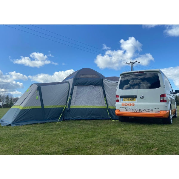 Hive Breeze Campervan Awning in a field attached to a motorhome