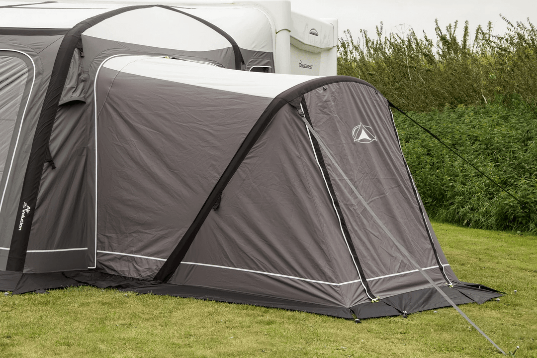 Sunncamp Icon Esteemed Air Annex in grey ooutdoor field.