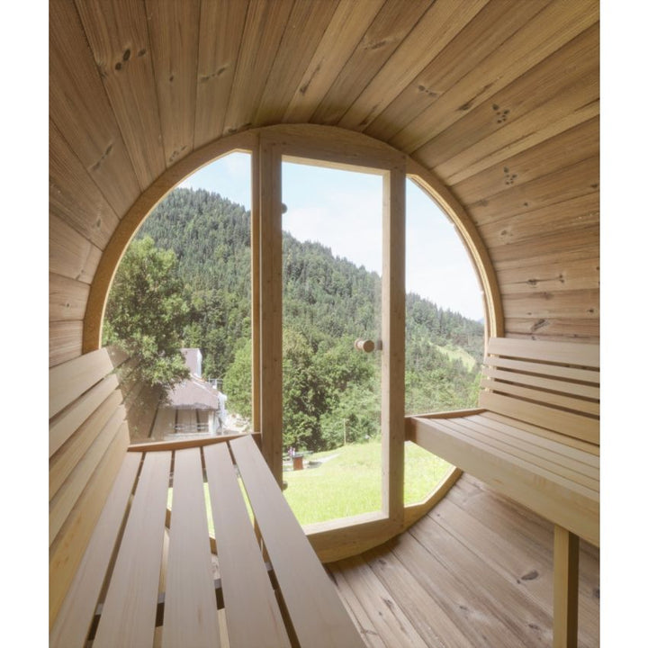 Interior view of the InMedias Ergo 150 Sauna with glass door and mountain view.