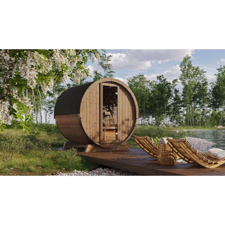 InMedias Ergo 180 Barrel Sauna by a lake.